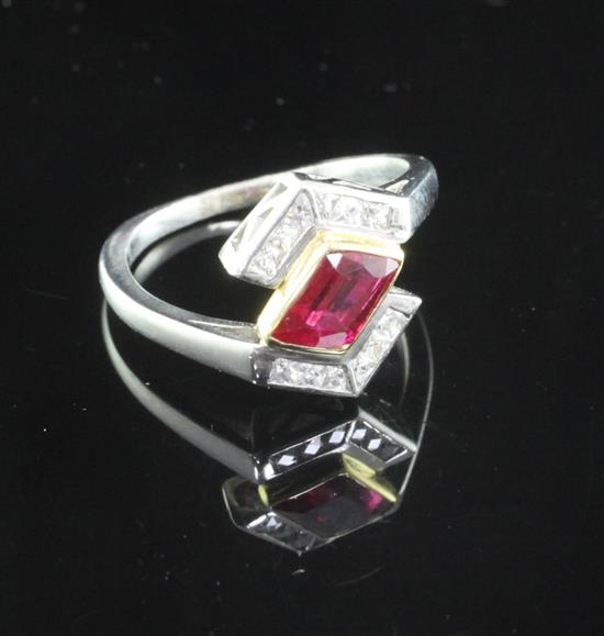 A stylish 18ct gold and platinum, ruby and diamond ring, size L.